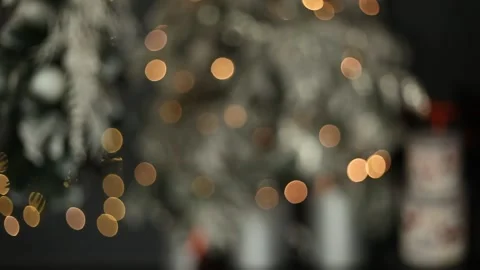 Defocused Christmas tree with lights and ornaments. Video stock 205572328