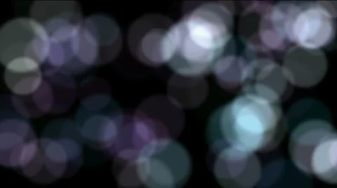 Defocused circle lights drifting downwards,christmas background,blur street ligh 库存影片 908080