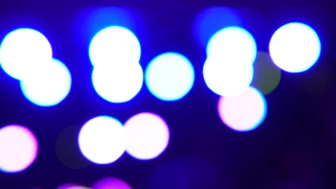 Defocused colored lights on stage. Party, disco, blurry lights and silhouette Stock Footage 170745737