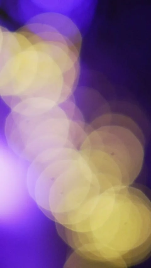 Defocused colorful lights at a party creating a blurred background with bokeh 스톡 동영상 344984977