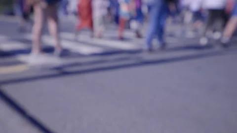 Defocused crowd of people, road intersection crosswalk Stock Footage 139401337