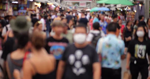 Defocused crowd of people walking at Chatuchak Weekend Market, slow-mo Stock Footage 326375139