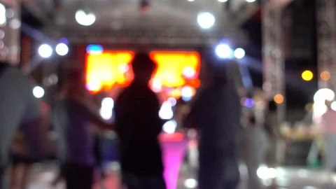 Defocused disco background. Multicolored beams and disco lamp lights. Colorfu Stock-Footage 92784906