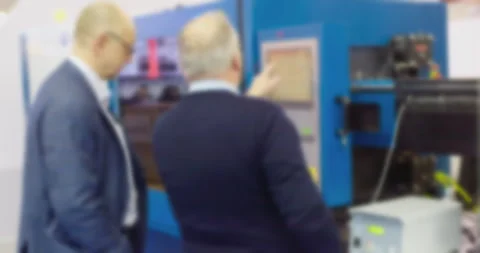 Defocused discussion of technology at professional presentation Stock Footage 303637548