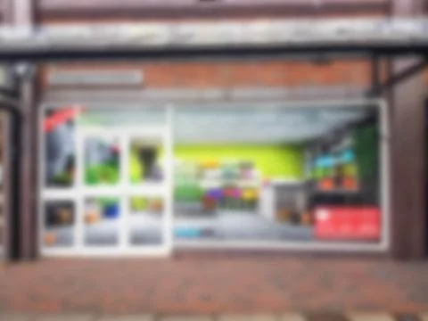 Defocused Empty retail shop unit with to let fake window display Stock Photos