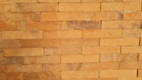 Defocused of exposed brick wall texture background Stock Photos
