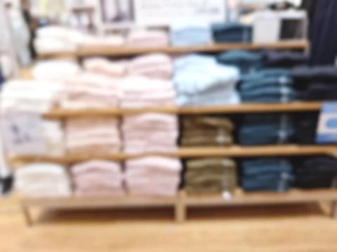 Defocused Fabric Pile. Blurred Stack of Colorful Clothes Stock Photos