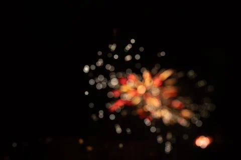 Defocused fireworks background Stock Photos