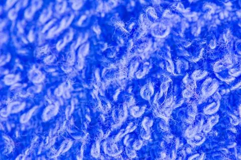 Defocused fluffy wool texture on blur background, abstract blue color backgro Stock Photos