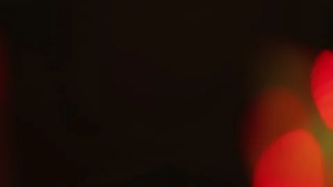 Defocused glow color light overlay red neon flecks Stock Footage 194323759