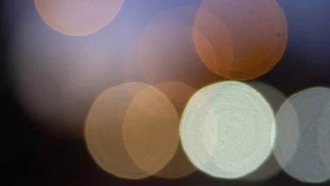 Defocused golden circles light effects, abstract blurred motion boche background Stock Footage 93399862
