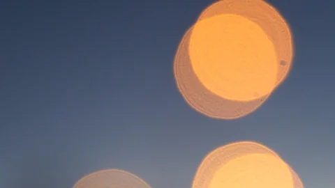 Defocused golden circles light effects, abstract blurred motion boche particles Stock Footage 93401467