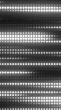 Defocused grayscale LED light rows creating an abstract bokeh pattern for t.. Illustrazione stock