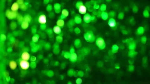 Defocused green lights in slow motion Stock Footage 86788447