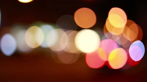 Defocused headlights of  night city Stock Footage 120860352