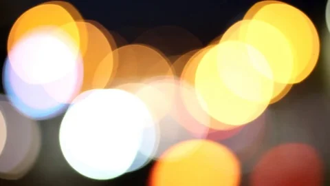 Defocused highway traffic during evening rush hour. The big defocused lights Stock Footage 81046505