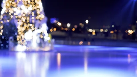 Defocused Ice machine cleans skating rink Stock Footage 122006154