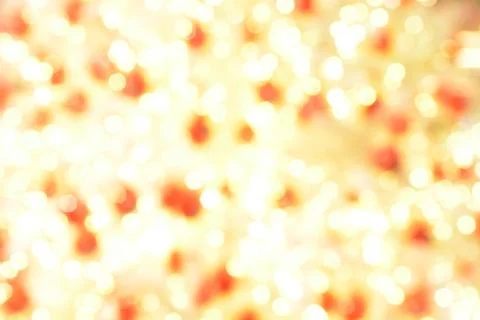 Defocused image of christmas light background, red and yellow. Stock Photos