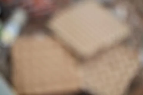 Defocused image of flatbread stacks creates an evocative, textural backgrou.. Stock Photos