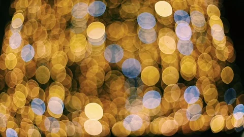 Defocused image of illuminated lights at night Stock Footage 99499391