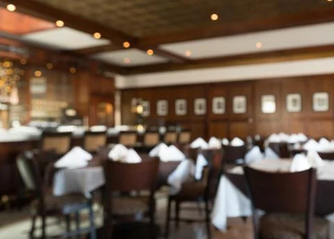 Defocused interior of modern restaurant Stock Photos