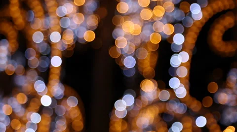 Defocused intermittent multi colored lights Stock Footage 58656466