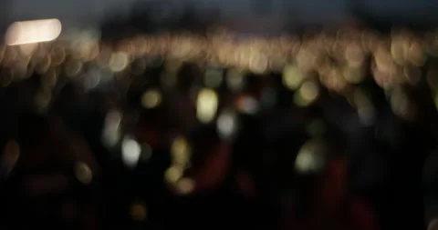 Defocused Large crowd dancing at a music concert vintage look slow motion Stock Footage 130481645
