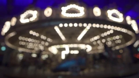Defocused  lights of carousel horses at Melbourne luna park Video stock 73308132