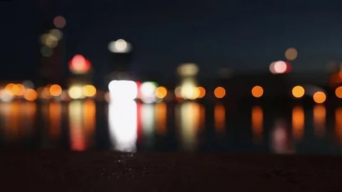 Defocused lights of a city at night Stock Footage 83083662
