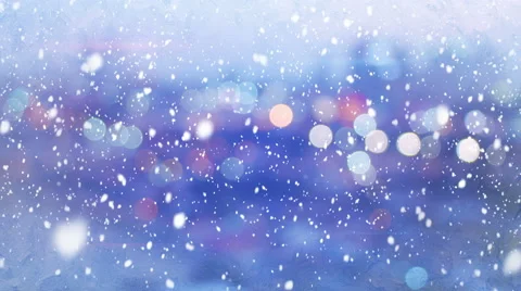 Defocused lights evening wintry city and snowfall loop 4k (4096x2304) Stock Footage 55004758