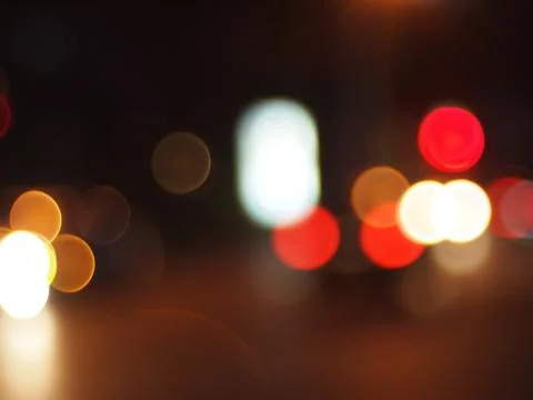 Defocused lights from the headlights Stock Photos