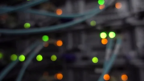 Defocused Lights Of Working Data Servers With Cables And Flashing LED Lights Stock Footage 114295436