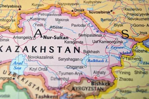 Defocused Map Background Highlighting Karaganda Geography and Travel Concept Stock Photos