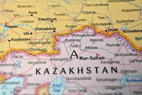 Defocused Map Background Highlighting Kostanay Geography and Travel Concept Stock Photos