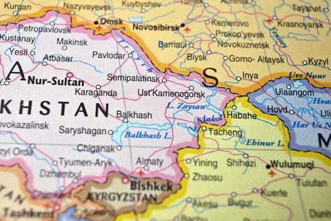 Defocused Map Background Highlighting Ust-Kamenogorsk Geography and Travel .. Stock Photos