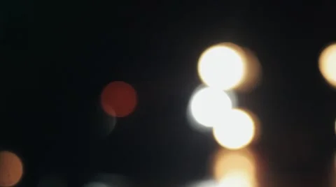 Defocused night car headlights. Night traffic lights Stock Footage 63095487