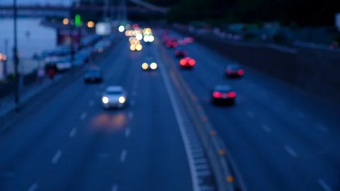 Defocused night city car traffic lights. Color blurred bokeh of moving transp Stock Footage 112791553