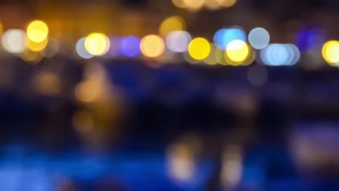 Defocused night traffic lights and sea Stock Footage 78556973