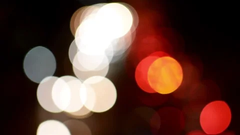 Defocused night traffic lights - blurred abstract background Stock Footage