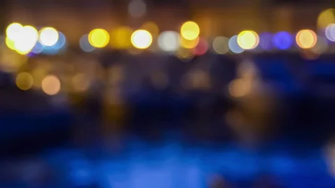 Defocused night traffic lights with sea Stock Footage 78556972