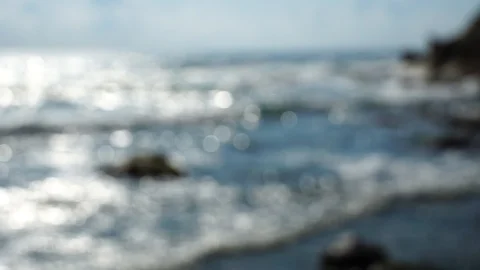 Defocused ocean waves with bokeh lights Stock Footage 115274711