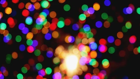 Defocused or blurred round lights, circles and sparkles on full black screen Stock Footage 96836442