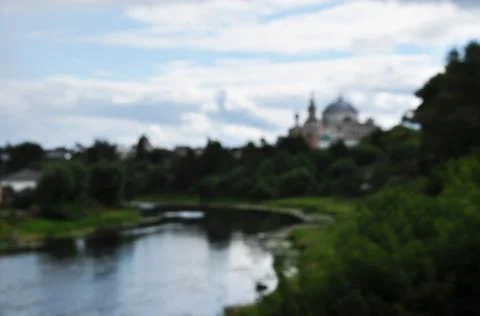 Defocused panorama of the river. Stock Photos