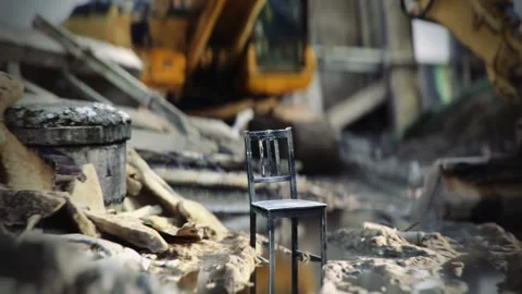 Defocused panoramic shot of messy construction site. Lonely chair in the middle Video stock 242802262