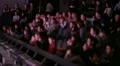 Defocused people applaud at theatre. HD Footage
