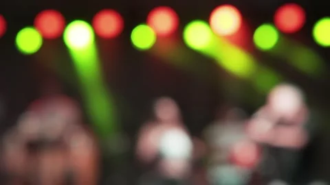 Defocused people dancing and singing in a night club, blurry scene Stock Footage 250551827