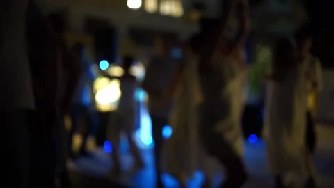 Defocused. people dancing in the dark. summer party Stock Footage 160895534