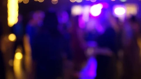 Defocused people dancing with disco lights original bokeh. Stock Footage 114803984