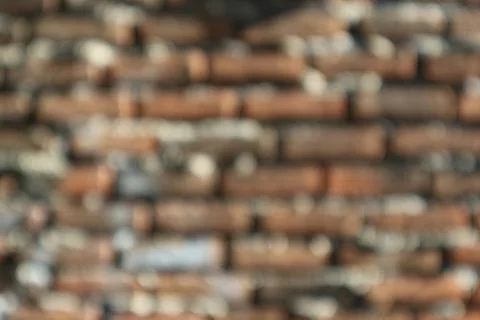 Defocused Red Brick wall texture background Stock Photos