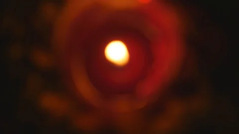 Defocused red candle lighting in the night Stock Footage 106400690